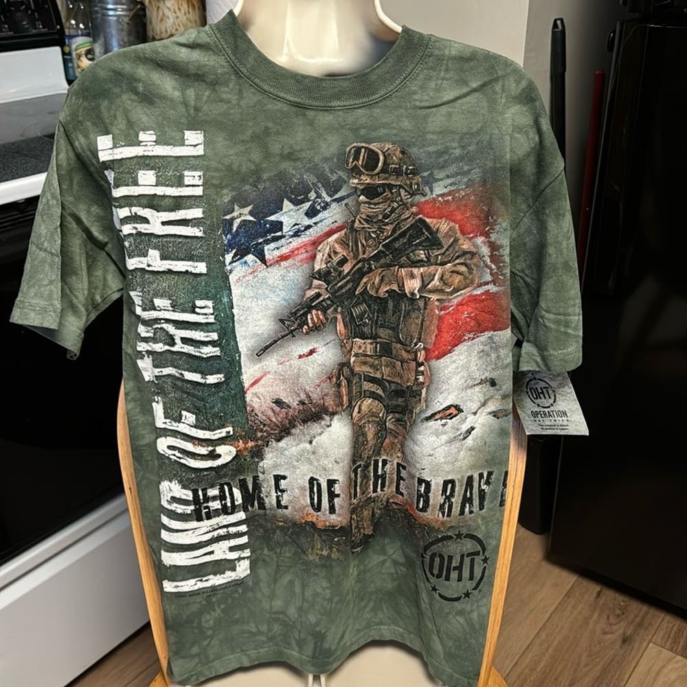 The Mountain S NWT Soldier flag HOME OF THE BRAVE OPERATION HAT TRICK TEE SHIRT